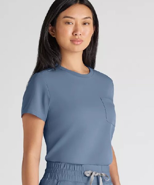 https://www.uniformadvantage.com/resurge-citrine-women-s-1-pocket-crew-neck-tuck-in-wear-out-scrub-top/RE5541.html?dwvar_RE5541_color=INBAT